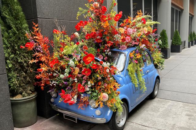 A photo of a car filled with flowers in Midtown